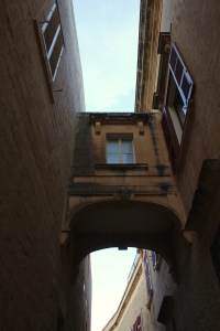 Connecting corridor over a narrow alley in Mdina Malta