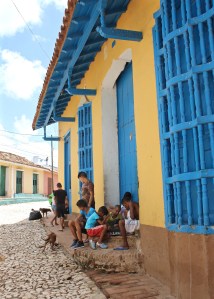 Kids playing checkers on the street, Trinidad Cuba