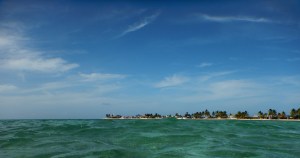 View over Playa los Cocos and La Boca from the turquoise water