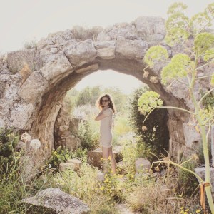 Sofie under a Roman viaduct in the ancient city of Salamis