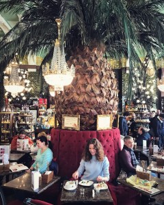 Eating caviar canapés at Yeliseyevsky Gastronom in Saint Petersburg