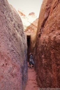Girl in a narrow alley of Lalibela's rock-hewn churches