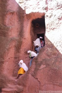 Pilgrims descending a steep stairway at Lalibela's rock-hewn churches