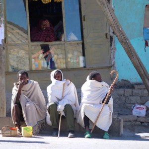 Three Ethiopian men waiting by the road