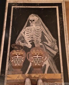 Memento mori on a marble tombstone