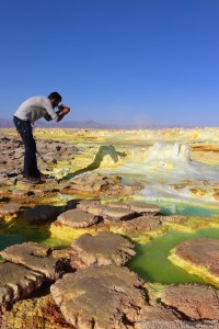 Photographer at Dallol hot springs, Danakil Depression Ethiopia