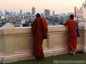 Buddhist monks on top of Wat Saket