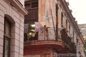Boy on a balcony in Havana