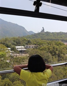 Girl in the Ngong Ping 360 cable car to Tian Tan Buddha