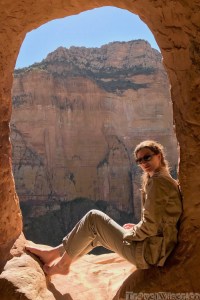 Girl sitting in the doorway to Abuja Yemata Guh church