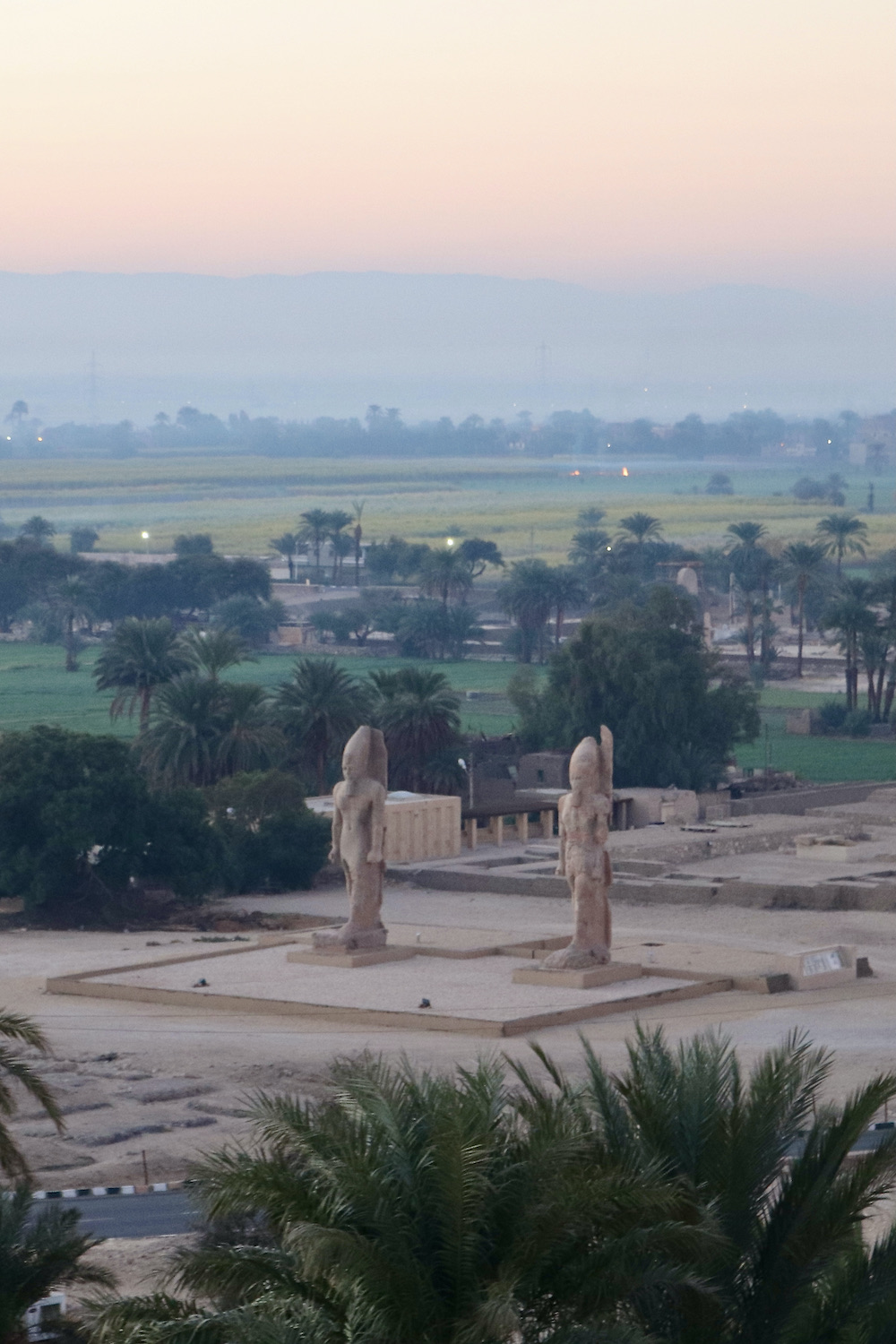 Colossi of Memnon Luxor west bank seen from a balloon
