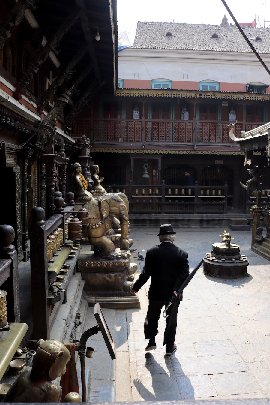 Elegant old man at the Golden Temple in Patan Nepal