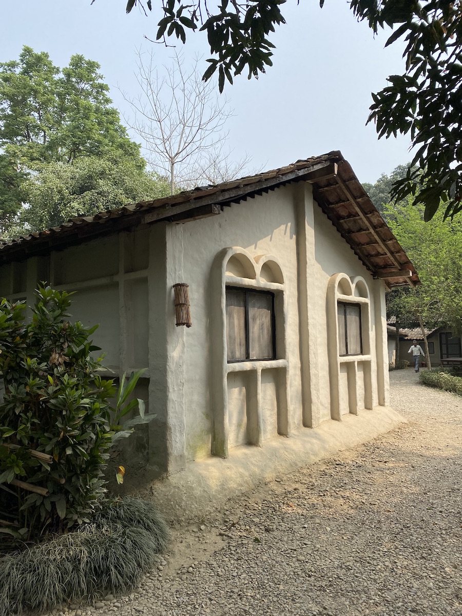 Tiger Tops Tharu lodge guest rooms in traditional style